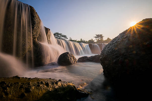 istock Big waterfall called Mini Niagara in Indonesia 542835128