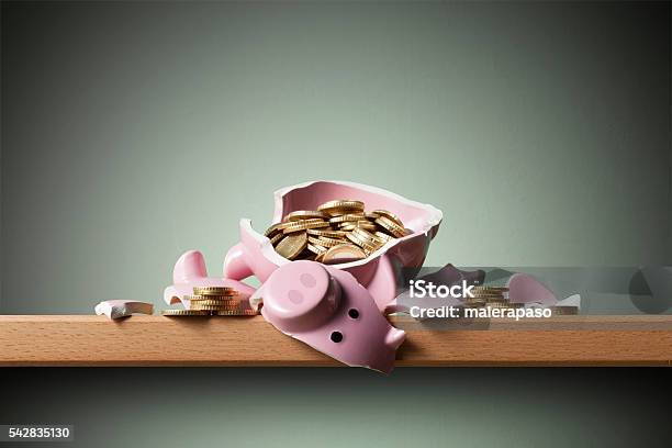 Savings Broken Piggy Bank With Coins Stock Photo - Download Image Now - Breaking, Broken, Piggy Bank