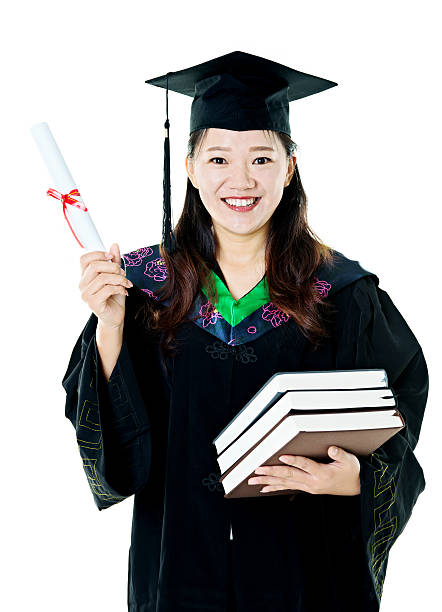 istock Female graduate holding books 542835152