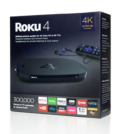 Miami, USA - June 21, 2016: Roku 4 Ultra HD box. Roku brand is owned by ROKU, INC.