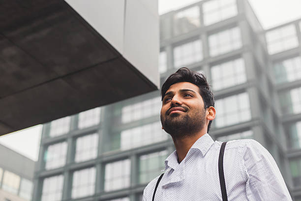 istock Handsome Indian man posing in an urban context 542838168