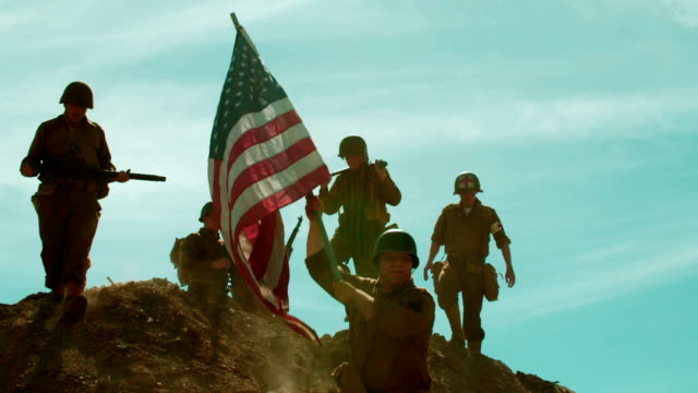 American Soldiers Taking Flag up Hill