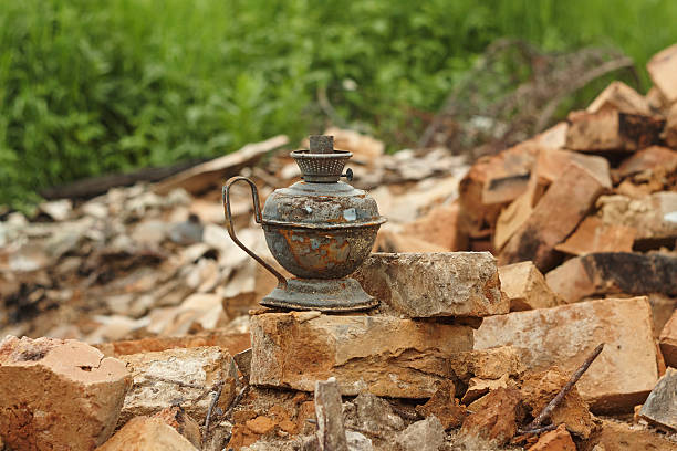 burned oil lamp kerosene on broken brick