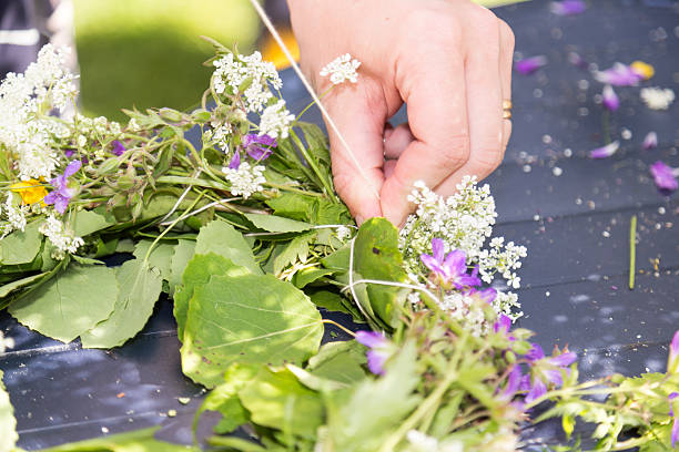 istock Woman Making a Swedish Midsummer Head Creation 542926916
