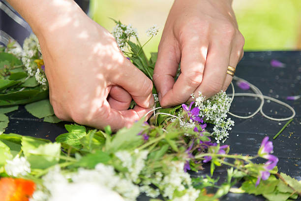 istock Woman Making a Swedish Midsummer Head Creation 542926956