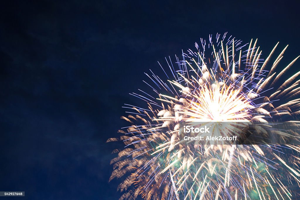 fireworks 4th July fireworks. Fireworks display on dark sky background. Firework - Explosive Material Stock Photo