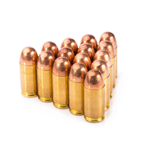 istock 9mm bullet for a gun isolated on white background 542928186