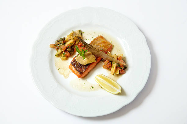 istock Grilled piece of salmon with vegetable and lemon 542928560