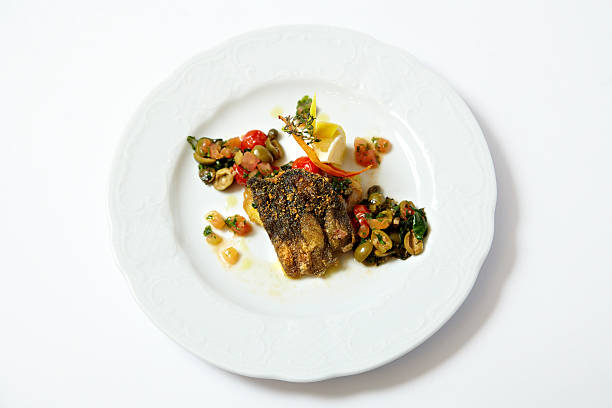 istock Grilled duck fillet with stewed vegetable and olives 542928938