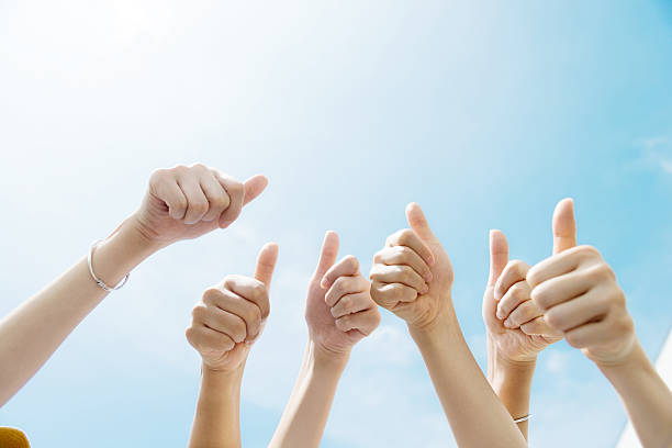istock Group of people giving thumbs up 542928994