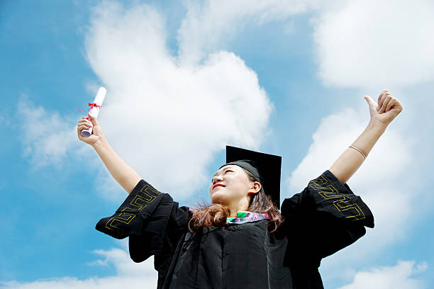 istock Happy female graduate 542929262