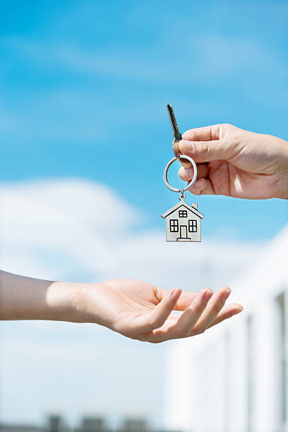 istock Handing over the house keys 542930018
