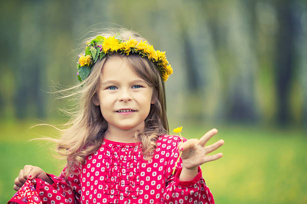 istock Little girl in spring park 542931602