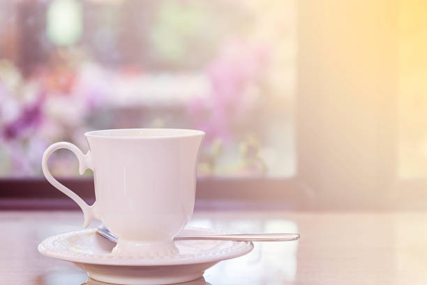 istock Coffee cup on the table in coffee shop. 542932372