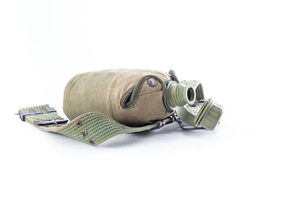 istock Military canteen and army belt on white background 542934220