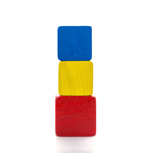 istock toy blocks, multicolor wooden bricks on white background 542934568