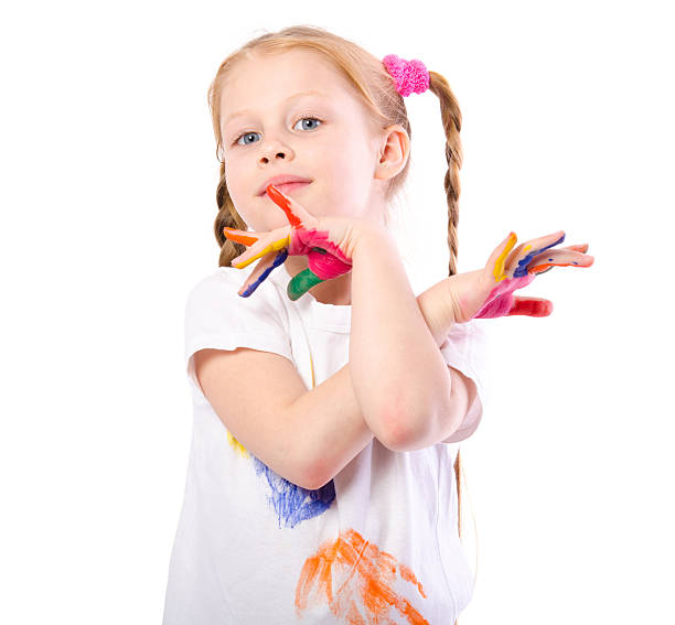 istock Funny girl with hands painted in colorful paint 542936652