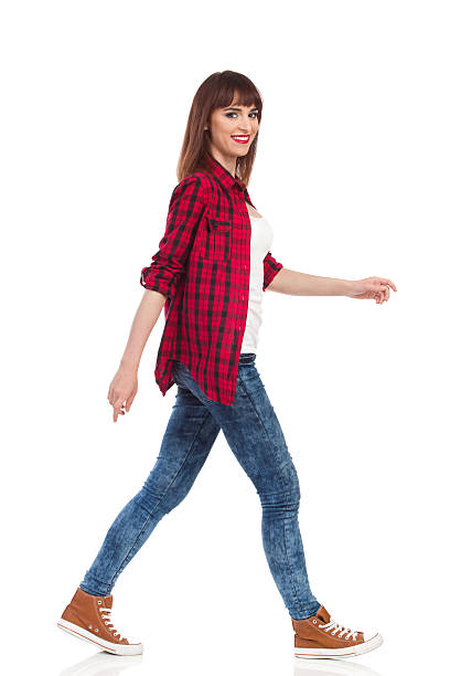 istock Walking Casual Girl Side View 542937384