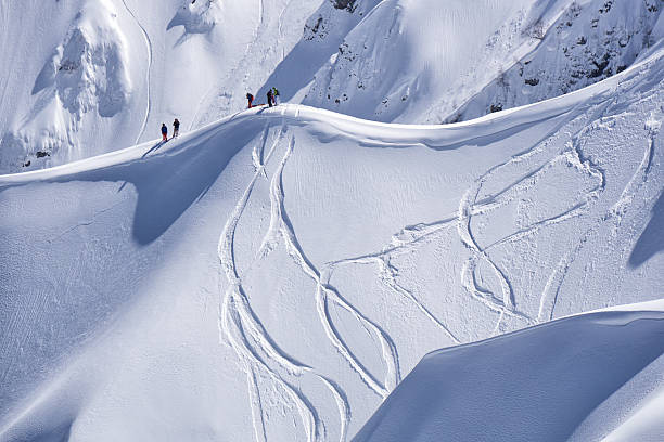istock Snowboard freeride, snowboarders and tracks on a mountain slope. Extreme 542937566