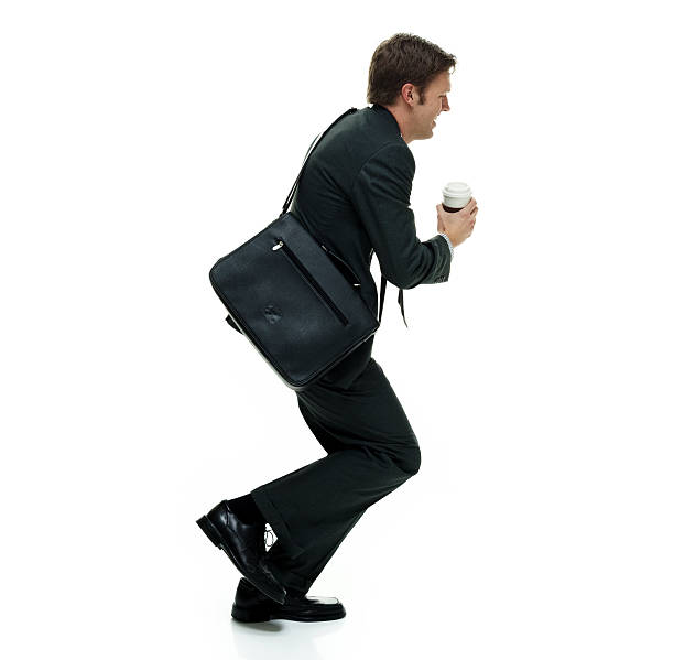 istock Smiling businessman running 542939776