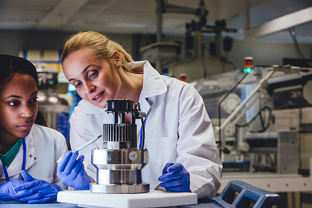 istock Medical Engineers Examining Equipment 542939864