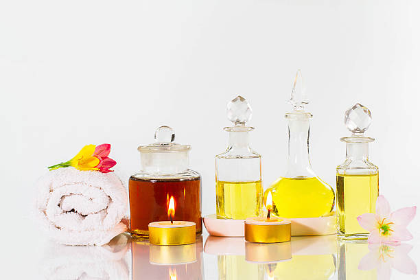 istock Vintage old bottles of aromatic oils on white background 542940392