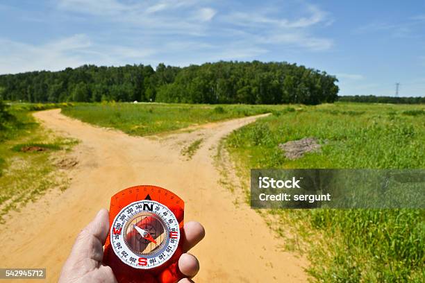 With The Compass On A Walk Stock Photo - Download Image Now - Adult, Adventure, Day