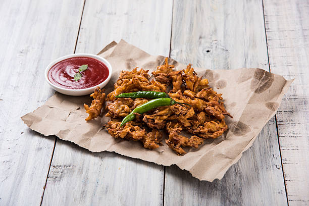 istock onion bhaji or pakora served with tomato ketchup 542946158