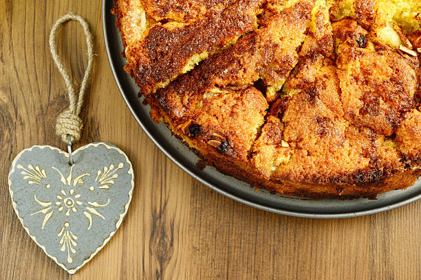 baking homemade apple cake with ingredients like honey, cinnamon, almond.