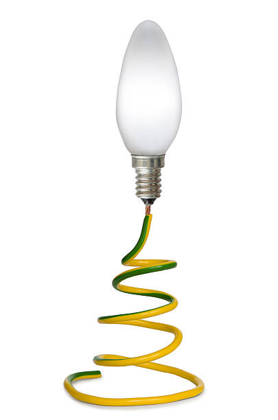 istock Copper wire in insulation  connected to the glowing  light bulb 542947102