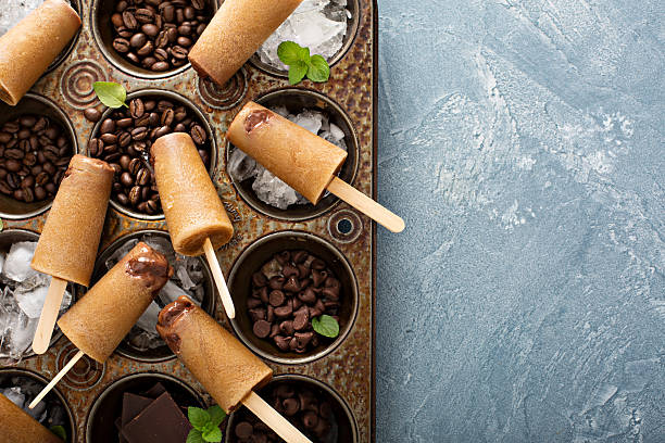 istock Coffee and cream popsicles with chocolate fudge 542947574