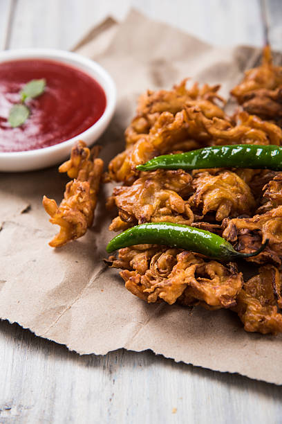 istock onion bhaji or pakora served with tomato ketchup 542947888