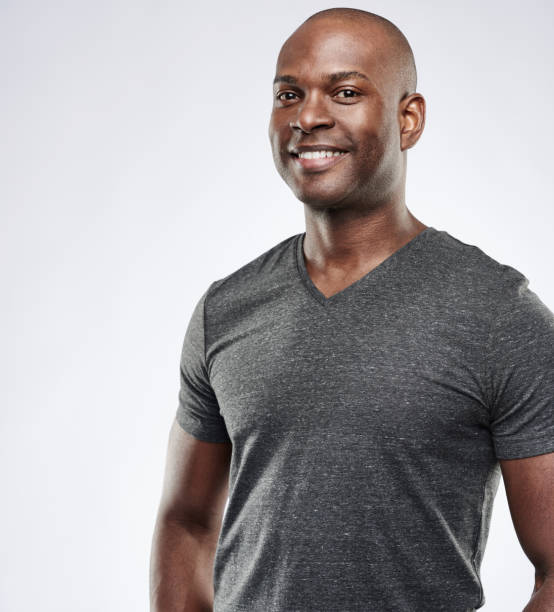 istock Proud muscular African man with pleasant smile 542948326