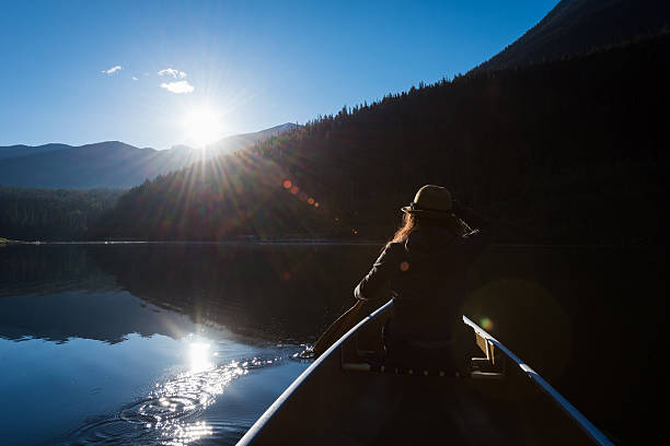 istock Sunrise paddle on the lake 542949414