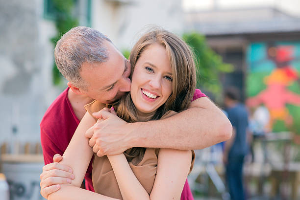 istock She is my better half, Portrait Of Couple Hugging 542952322