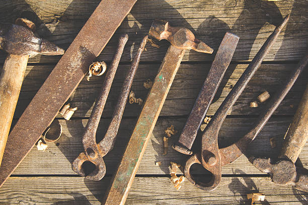 istock Rusty set of hand tools on a wooden background. Vintage 542952916
