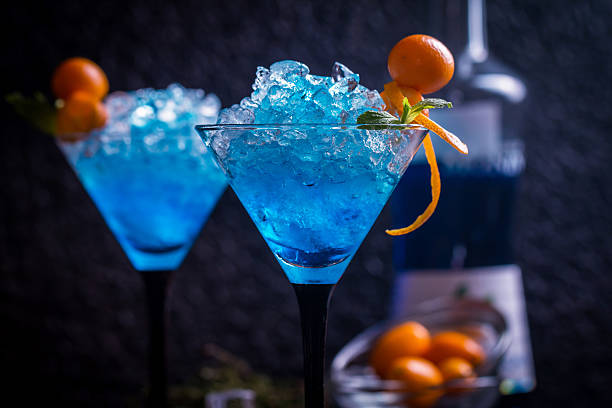istock Blue cocktail in martini glasses 542959318