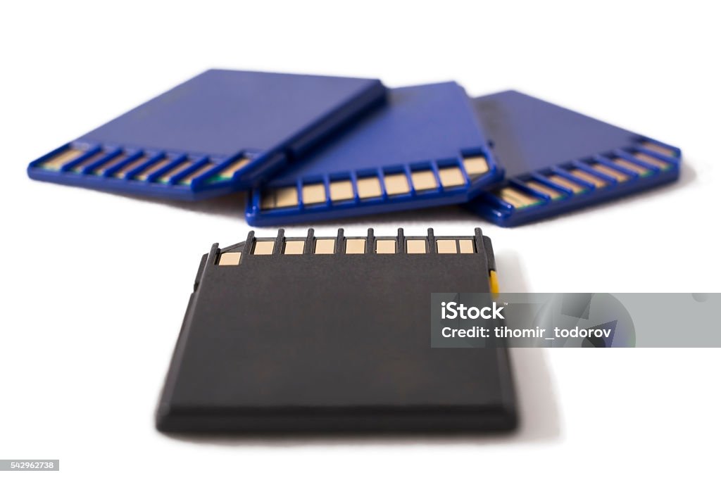 Black and blue memory cards on white background Beautiful macro photo of black and blue memory cards on white background Advice Stock Photo