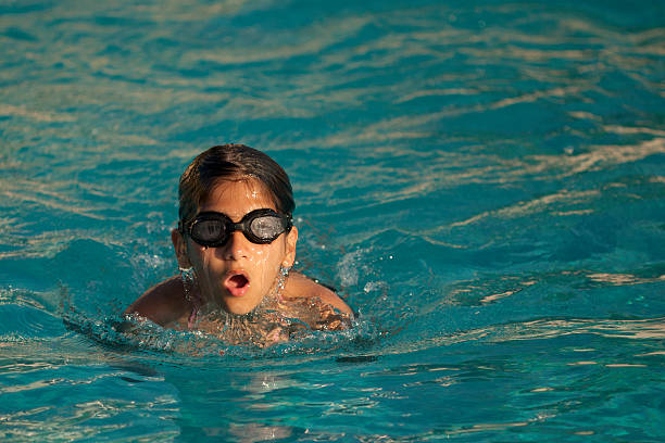 nuoto  - lifeguard swimming pool summer swimming foto e immagini stock