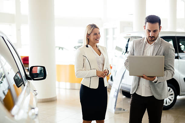 istock Customer looking for a car at dealership 542963906