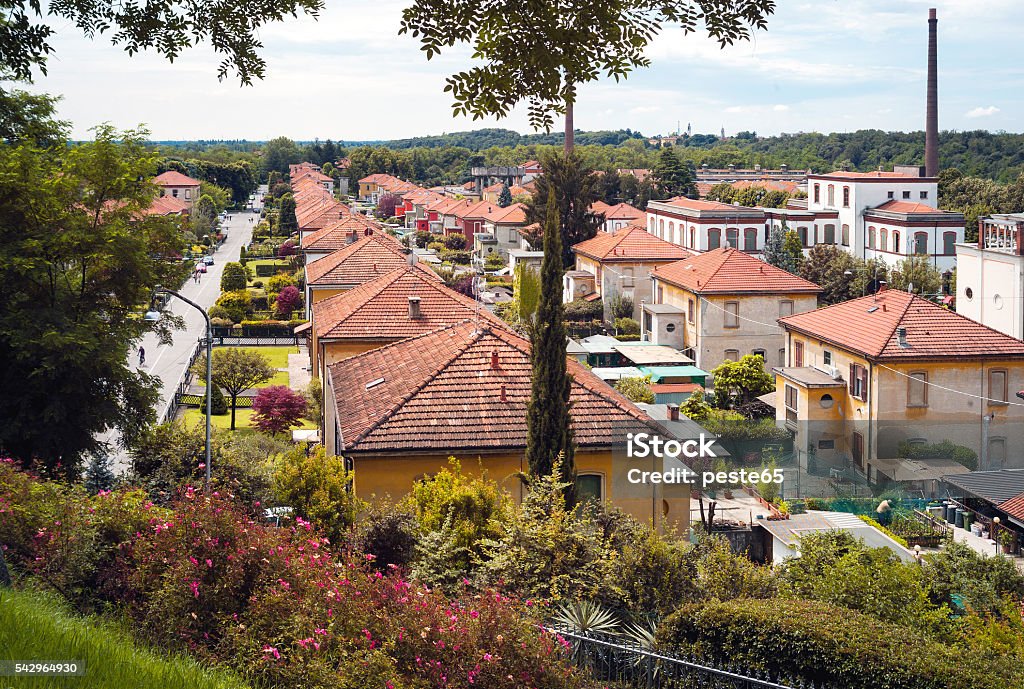 Worker village of Crespi d’Adda. Color image View of the Worker Village of Crespi d'Adda (Bergamo province, near the border of Milano area); perfectly preserved example of working construction at the turn of the nineteenth and twentieth centuries, is UNESCO World Heritage Site since 1995. 19th Century Style Stock Photo