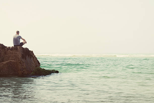 Magical view of Wadi Sinaq in Salalah province, Southern Oman, lagoon ending with a sandy beach