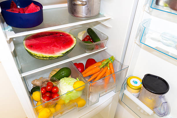 istock Fridge filled with fruits and vegetables 542966112