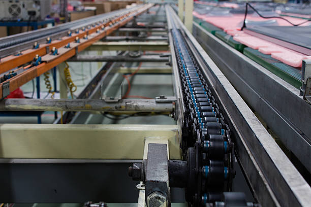 istock The chain and shaft drive  Line Conveyor 542966954