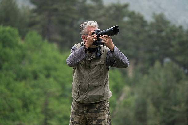 istock Photographer taking pictures 542966990