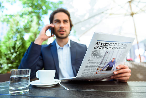 istock Successful young businessman communicating on telephone 542970710
