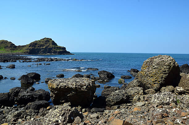istock rocky coast with many rocks in Ireland with blue sky 542970972