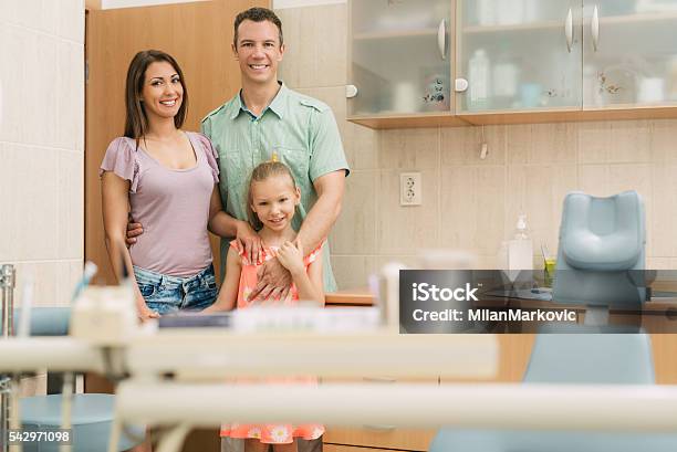 At The Dentist Stock Photo - Download Image Now - Dentist, Family, Embracing