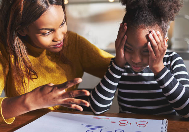 istock Frustrated child learning to calculate 542971226