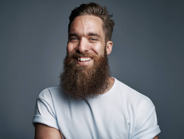 istock Bearded handsome man with big smile 542972624
